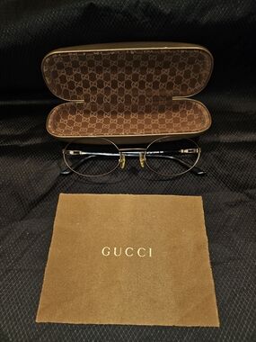 Gucci Men's Round Metal Frame Glasses in Black and Gold